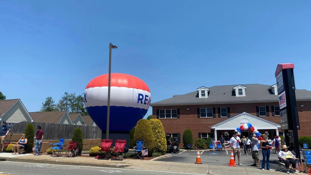 event with re/max balloon branding