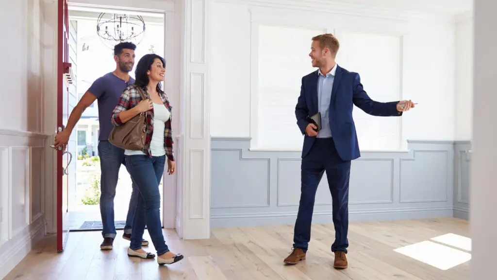 real estate agents showing properties